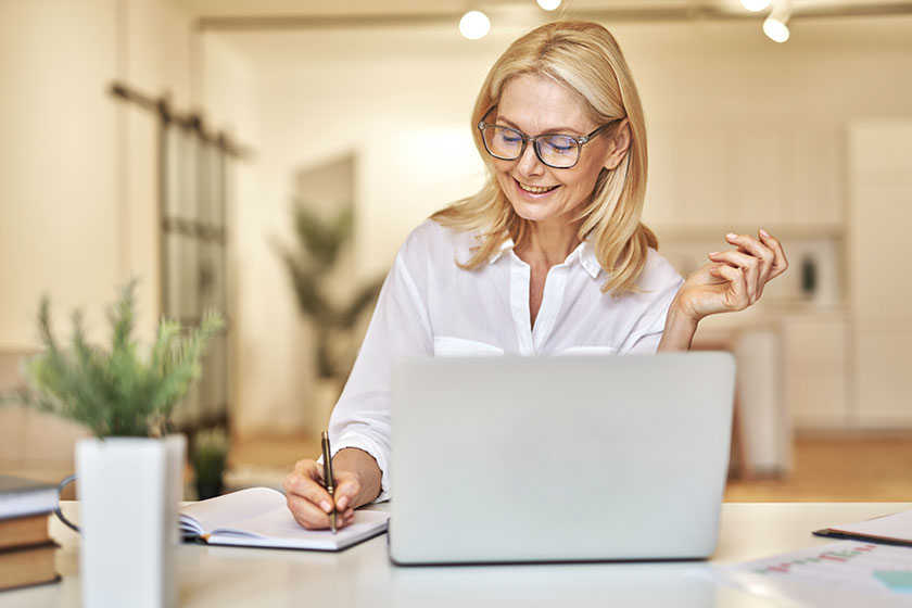 Attractive mature businesswoman smiling